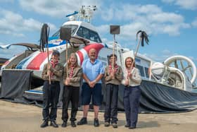 IOW Explorer Scouts display their fire-beaters. Picture: @srf