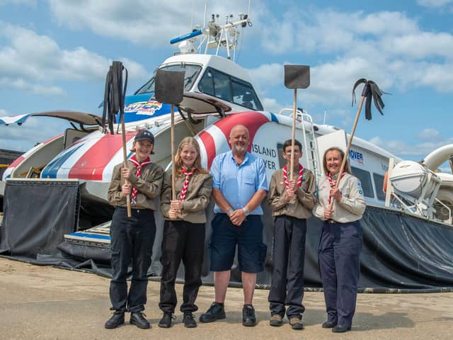 IOW Explorer Scouts display their fire-beaters. Picture: @srf