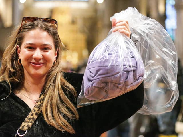 Morgan Reed with her bag of clothes to be weighed, and paid for by the kilogram.  Picture: Chris Moorhouse (010225-37)