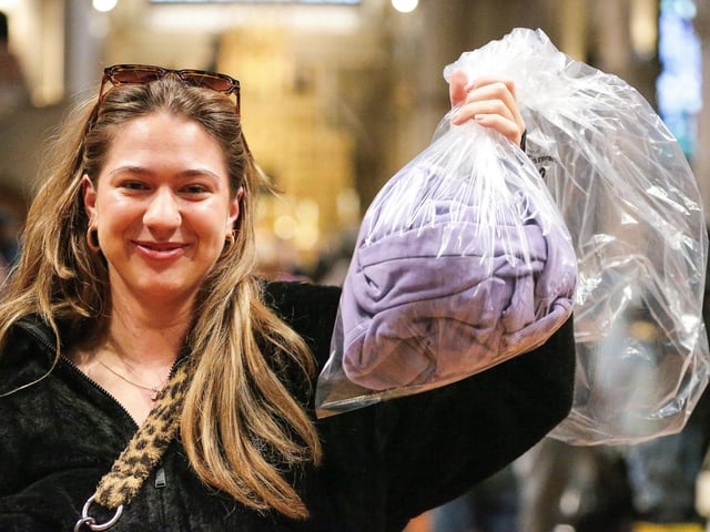 Morgan Reed with her bag of clothes to be weighed, and paid for by the kilogram.  Picture: Chris Moorhouse (010225-37)