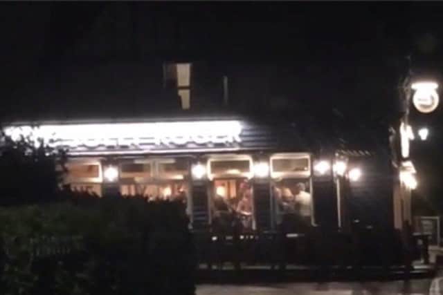 The footage was captured by a member of the public from outside the pub