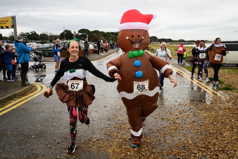 Charlotte and Laura Grimwood get into the festive spirit at the Christmas Pud 5k, Stokes Bay, Gosport