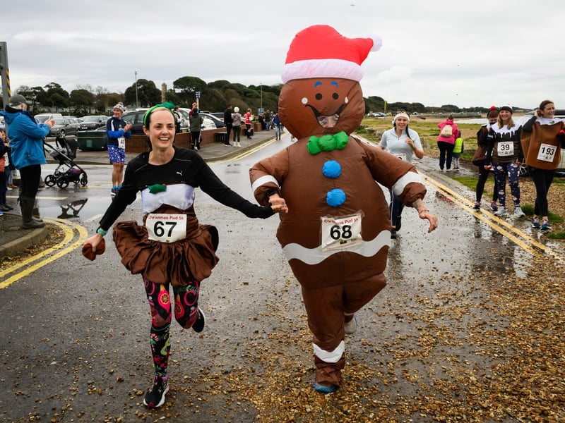Charlotte and Laura Grimwood get into the festive spirit at the Christmas Pud 5k, Stokes Bay, Gosport