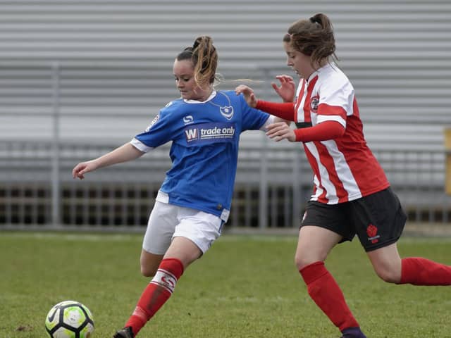 Ellie Bloomfield, left, in action for Portsmouth Women against Southampton in 2017. She has now signed for Moneyfields. Picture: Neil Marshall