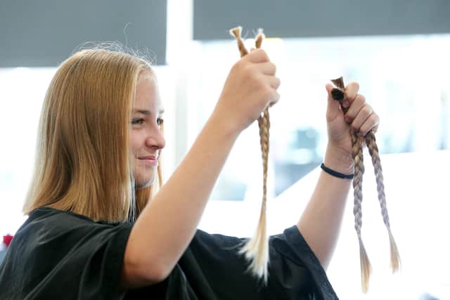Salon owner Tracy Hutton's work. Lucas Puckett, 12, loses his locks on behalf of The Little Princess Trust, Escape Hair Lounge, Milton Rd
Picture: Chris Moorhouse (280721-26)