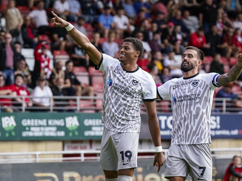 Substitute Kusini Yengi scored Pompey's fourth goal from the penalty spot in stoppage time