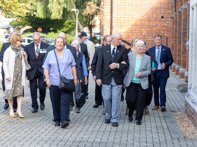Pictured - Families arriving at the Church of St Barbara
Photos by Alex Shute