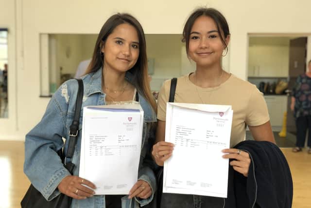 A-level results, Portsmouth High School: Twin sisters Natasha and Alicia Small, 18 from Portsmouth, celebrate getting the results needed to go to university. Picture: Byron Melton
