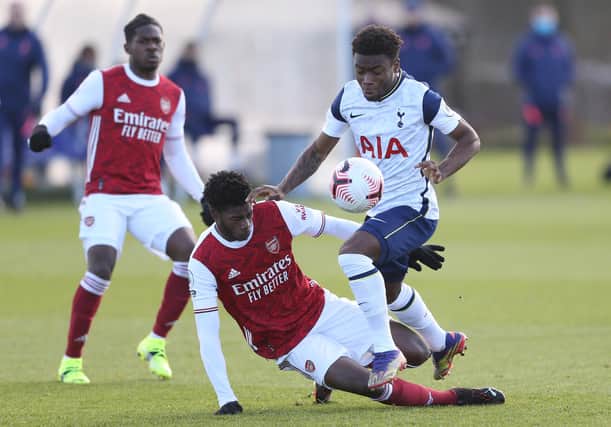 Ryan Alebiosu battles with Spurs' Nile John in a PL2 match (Photo by Paul Harding/Getty Images)