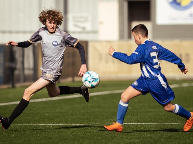Action from the U15 Campbell McFaull Invitation Cup final between Hayling St Andrews Blue and Hayling St Andrew White. Picture: Keith Woodland (260221-75)