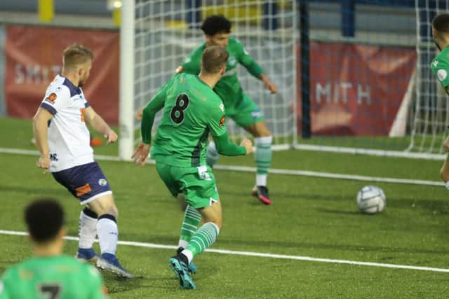 Tommy Wright scores Hawks' National League South winner against Oxford City in November. Pic: Dave Haines.