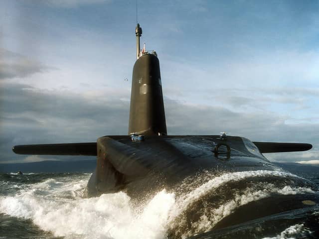 A sailor aboard HMS Vanguard has been arrested over a suspected bomb hoax on the nuclear submarine.