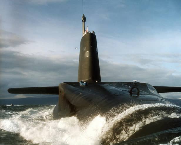 A sailor aboard HMS Vanguard has been arrested over a suspected bomb hoax on the nuclear submarine.