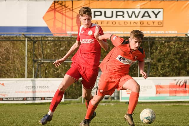 Kye Harttt, left, was part of a superb Horndean defensive performance in last night's stunning FA Youth Cup win at Woking. Picture: Keith Woodland
