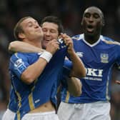 Sean Davis, left, celebrates a Pompey goal with Sol Campbell and David Nugent