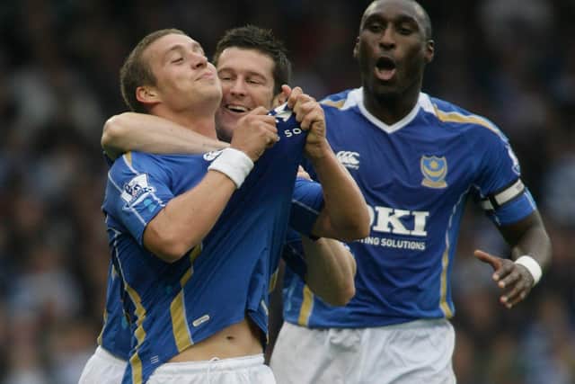 Sean Davis, left, celebrates a Pompey goal with Sol Campbell and David Nugent