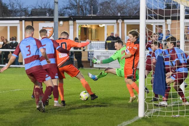 Portchester cause panic in the Hamworthy penalty area. Picture: Keith Woodland