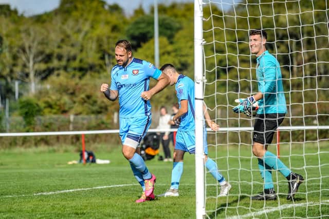 Brett Pitman jogs away after netting one of his four FA Vase goals against East Cowes. Picture by Daniel Haswell.