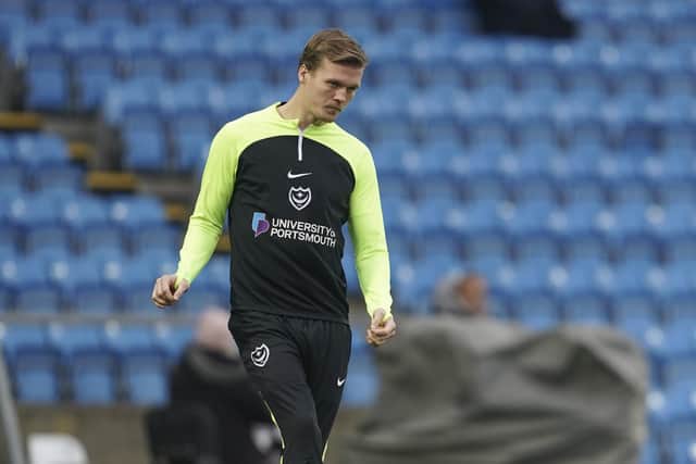 Sean Raggett finds himself on the bench for today's visit of MK Dons to Fratton Park