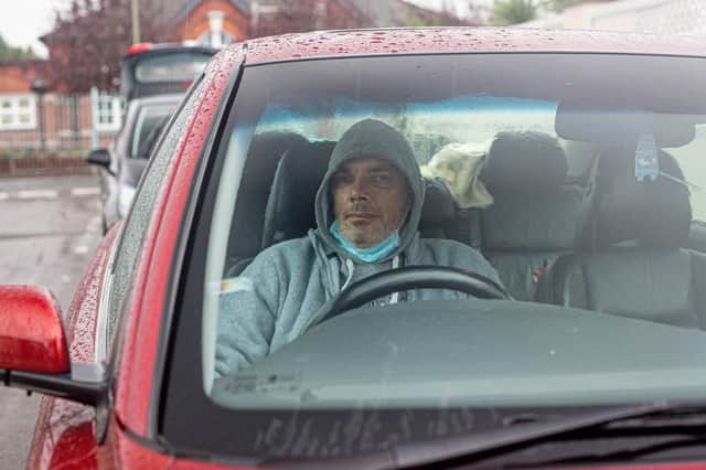 Ryan Kilby in his car in Gosport. Picture: Habibur Rahman