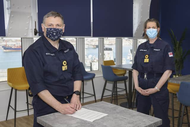 Commander of HMNB Portsmouth, Commodore JJ Bailey hands over the new HMS King Alfred facilities to Commander Maritime Reserves, Commodore Mel Robinson. Picture: RN