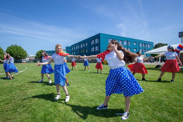 Dance students of Trafalgar School, Hilsea, Portsmouth celebrating outside their school