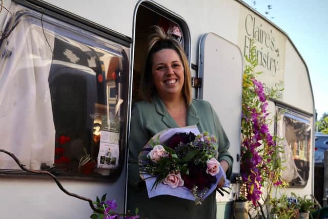 Claires Floristry is running a charity campaign that uses selfies to raise money for a domestic abuse charity. Pictured is owner Claire Lester