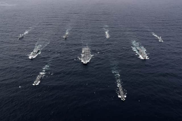 The Carrier Strike Group, with HMS Queen Elizabeth in the centre