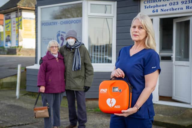 Beryl and Leslie Tombs from Farlington left a cheque for 1,000 pounds at the podiatry centre, Cosham after speaking to Tracey about their campaign to raise cash for a defibrillator
Pictured: Tracey Gregory with the defibrillator and Beryl and Leslie Tombs outside the Podiatry centre, Cosham, Portsmouth on 15 January 2021.
Picture: Habibur Rahman