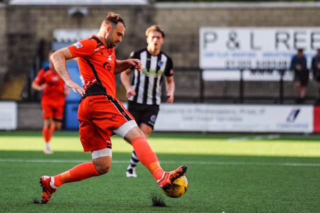 Brett Pitman on the ball for Portchester during their win at Dorchester. Picture by Daniel Haswell