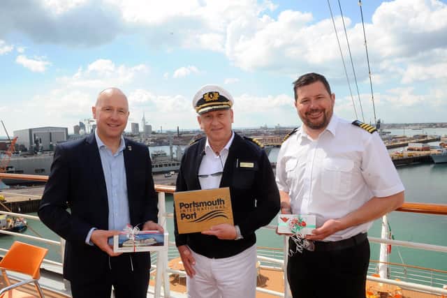 From left, Port director at Portsmouth International Port Mike Sellers, AIDAsol captain Thomas Mey and Ben McInnes, harbour master at Portsmouth International Port.
Picture: Sarah Standing (250422-2287)