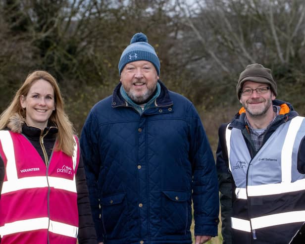 Great Salterns event director Kev Budd, centre, and volunteers Lou Griffin, left, and Ian Gregory Picture: Alex Shute