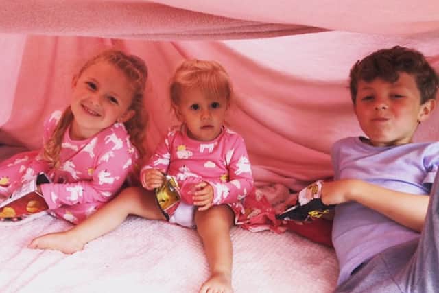 Esme Groves with her brother and sister