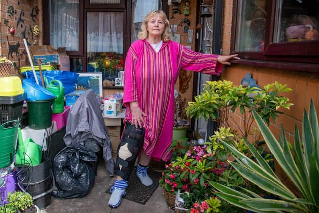 Susan Hunt, 70, was badly injured on her leg after being cut by a sharp piece of metal at a fly-tip site in George Street, Buckland.

Pictured: Susan Hunt outside her home in Buckland, Portsmouth on 13 July 2020.

Picture: Habibur Rahman