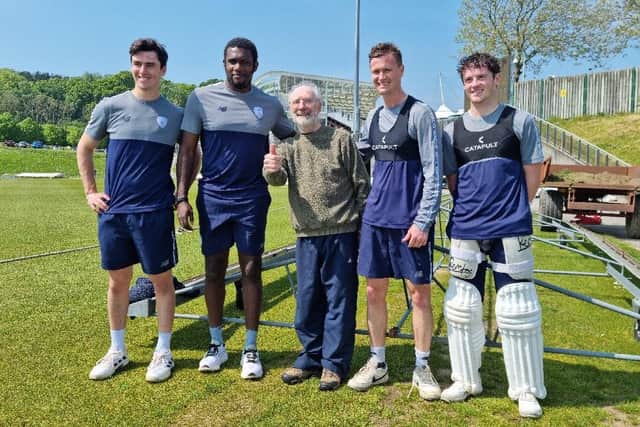 Barry Reed pictured with Hampshire cricketers on his visit to the Utilita Bowl earlier this year