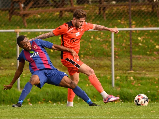 USP's Kelly Nwaehi and Portchester's James Cowan. Picture: Keith Woodland