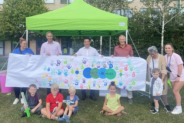 Alan Mak MP, headteacher Chris Anders and community manager Flo Fearon with children at the HAF club
