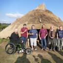 (Left to right) Dr Stuart Prior, Maureen Page, Elaine Corner, Simon Jay, Prof Alice Roberts, Richard Osgood, Dr Phil Harding, Trevor Creighton. Pic Butser Ancient Farm.