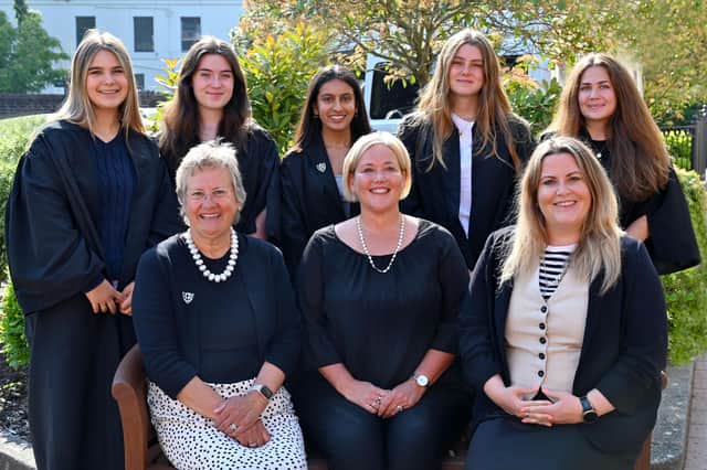 Back (from left) Larry, Olivia (Deputy Head Girl), Priyanka (Head Girl), Emma and Tabby (Deputy Head Girls Day School Trust). Front: Headmistress Jane Prescott, Claire Lambon (CEO Stop Domestic Abuse), Katie Wood (Head of Sixth Form)