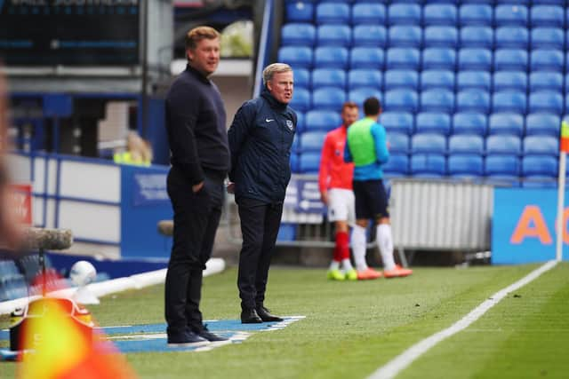 Kenny Jackett and Oxford boss Karl Robinson will today meet again for the deciding match in the play-off semi-final. Picture: Joe Pepler