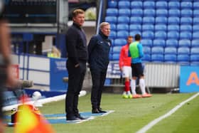 Kenny Jackett and Oxford boss Karl Robinson will today meet again for the deciding match in the play-off semi-final. Picture: Joe Pepler
