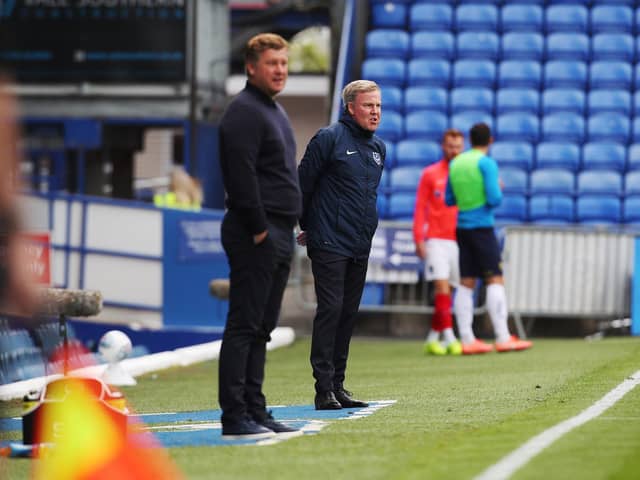 Kenny Jackett and Oxford boss Karl Robinson will today meet again for the deciding match in the play-off semi-final. Picture: Joe Pepler