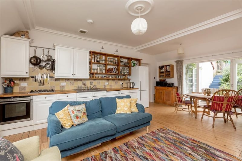 Open plan sitting room, dining room and kitchen.