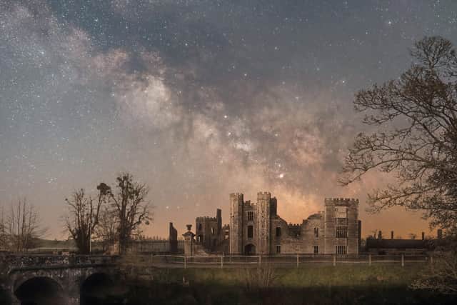 Undated handout photo issued by South Downs National Park Authority of 'Cowdray Comos' taken by Richard Murray which has won the top prize in the South Downs National Park astrophotography competition. The image, taken by Mr Murray from Waterlooville, captures the night-time scene at Cowdray ruins in Midhurst, West Sussex.