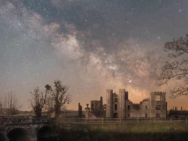 Undated handout photo issued by South Downs National Park Authority of 'Cowdray Comos' taken by Richard Murray which has won the top prize in the South Downs National Park astrophotography competition. The image, taken by Mr Murray from Waterlooville, captures the night-time scene at Cowdray ruins in Midhurst, West Sussex.