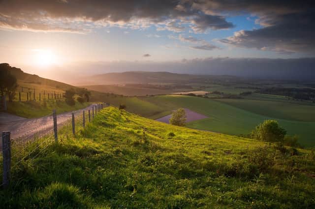 Sunset over rolling English countryside in the South Downs National Park