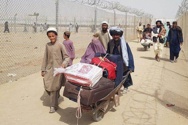 Afghans fleeing Kabul in August. Picture: PA