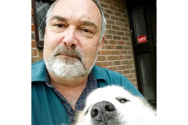Steve Richardson, 55, who has worked as a volunteer at St James' vaccine hub since February. Pictured with his dog Freya.