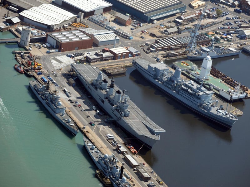 20th April 2011. Portsmouth Naval Base, HMS Ark Royal left and RFA Fort Austin (A386) right. Picture: Paul Jacobs 111408-18