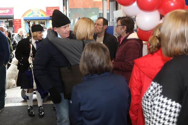 Gary Smy, the longstanding employee at Tesco in Cosham, welcomed by colleagues and customers and handed gifts and a cheque raised for him in February.

Picture: Sam Stephenson.